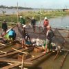 Een Pangkwekerij op een uitgegraven zijtak langs de Mekong rivier