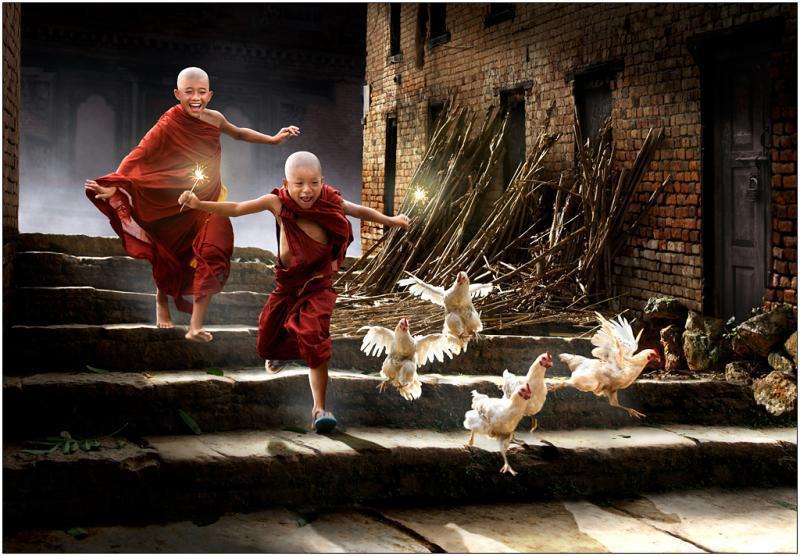 young buddhists with chicken