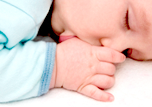 Duimen-en-fopspeen-baby